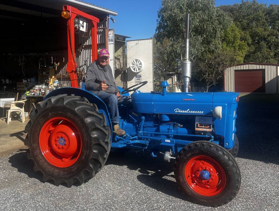 Roy White sitting on the restored Fordson Super Dexter tractor.