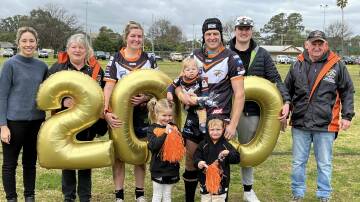 Aaron Earsman celebrated his 200th game for the Tigers with his family last weekend. Photo Narelle Hughes.