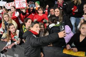 Arsenal's Steph Catley meets the fans after the A-League All Stars match at Marvel Stadium. (Joel Carrett/AAP PHOTOS)