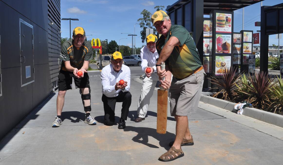 CATCHING FOR A CAUSE: Orange CYMS president Peter Snowden (right) and clubmates Tom (left) and Michael Wright (second from right) help Orange and North Orange McDonald's owner Todd Bryant sharpen his skills ahead of the club's six-a-side competition on Australia Day. Photo: DAVE NEIL 0121dncyms
